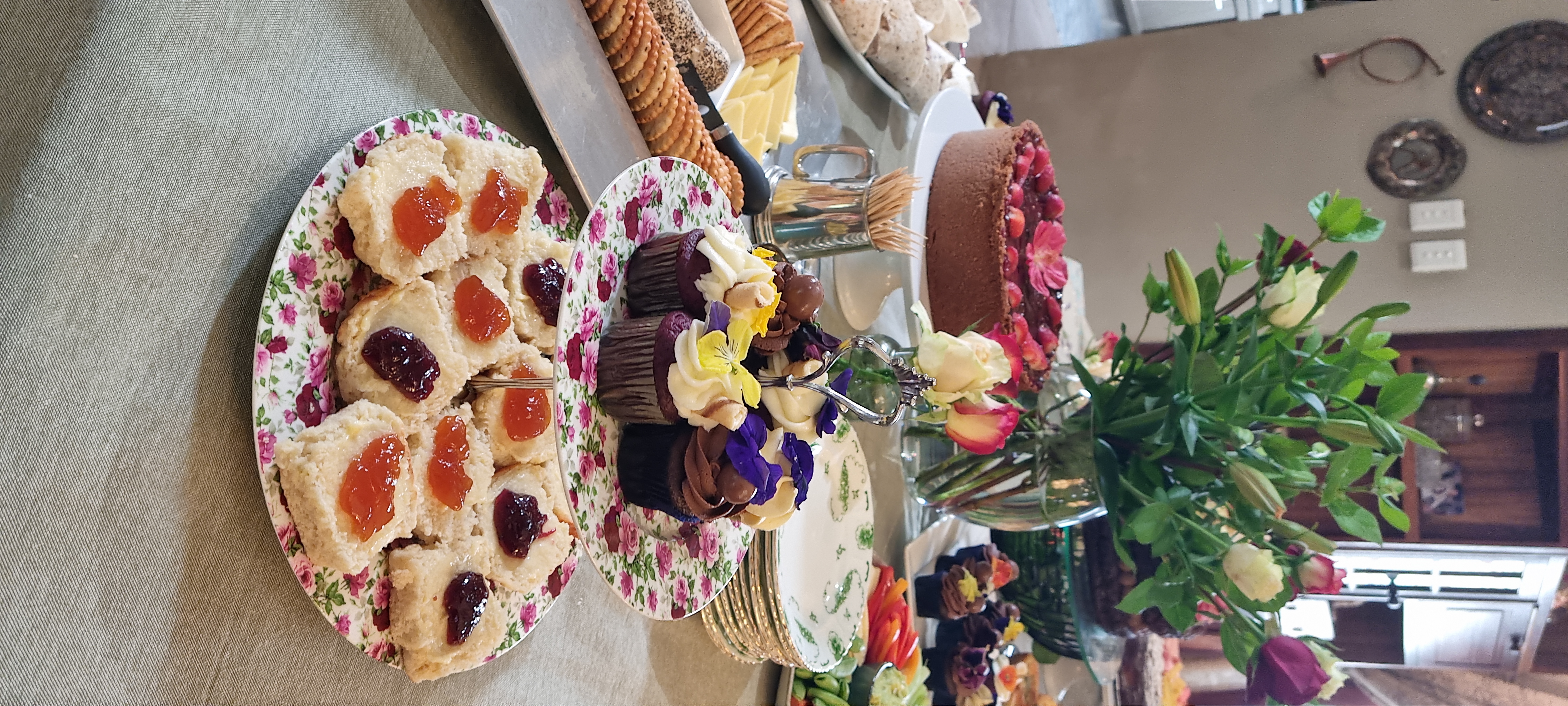Cupcakes and homemade bakes arranged on a table