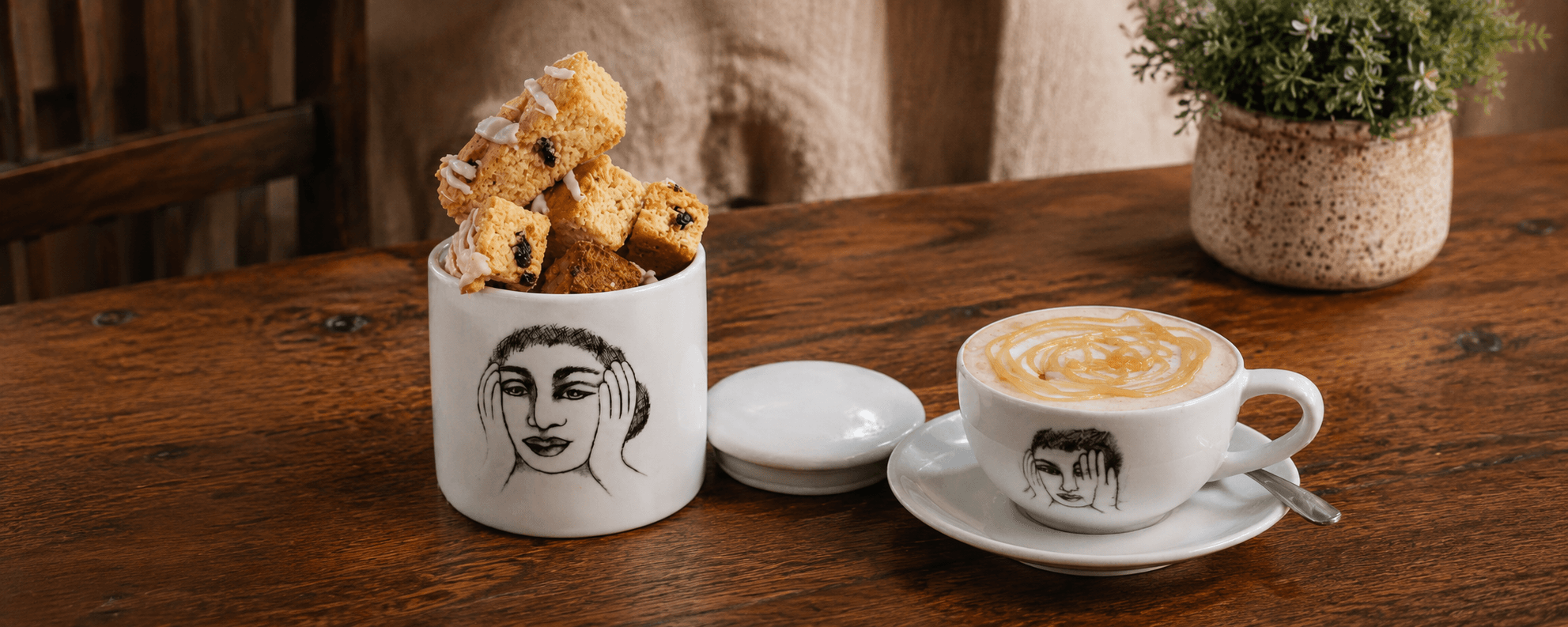 Homemade rusks served beside a cup of coffee